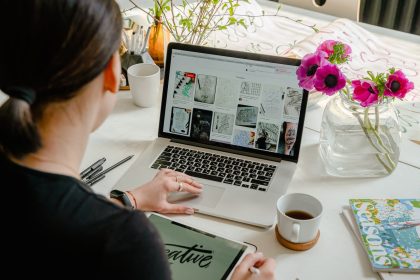 Photo Of Person Using Laptop For Graphic Designs